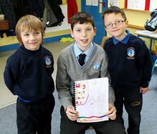 Fifth Class read their books to Senior Infants
